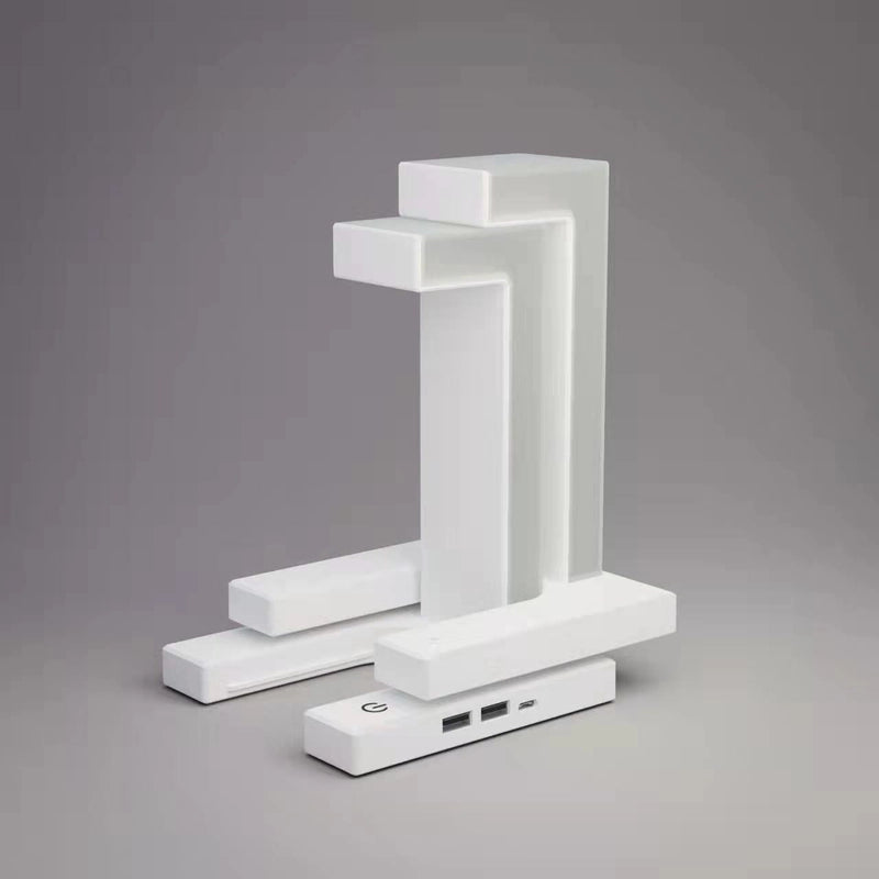 Creative wireless charging table lamp by stcraftdigital featuring a floating balance design for home or bedroom decor.