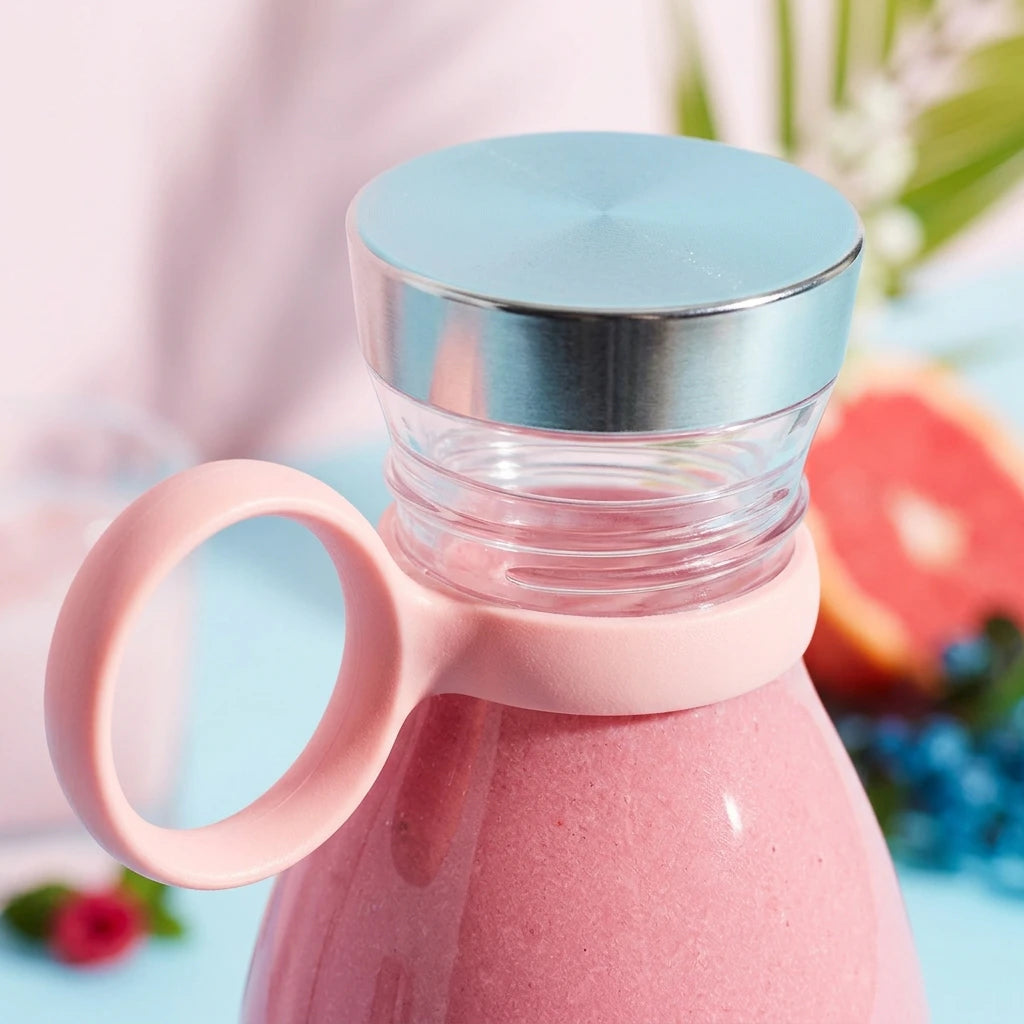 Portable Stcraftdigital 350ML electric juicer blender with USB recharge, showing the compact blender cup in a kitchen setting.
