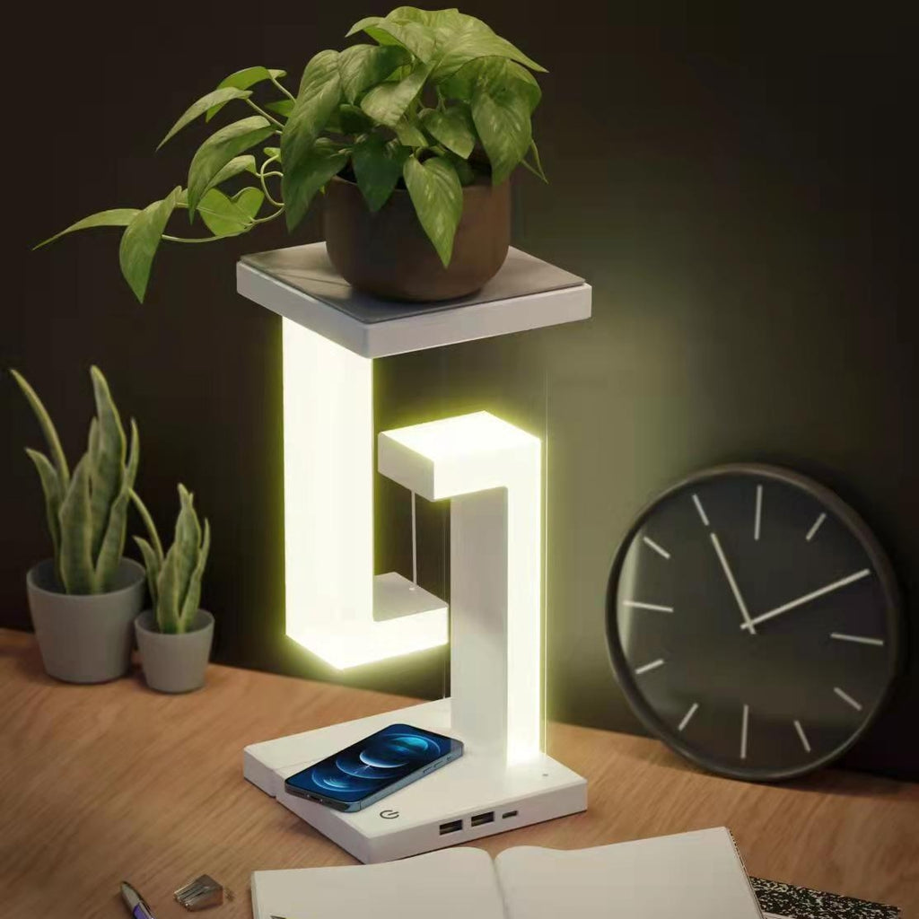 Wireless charging suspension table lamp by stcraftdigital featuring a floating, balanced design for home and bedroom lighting.