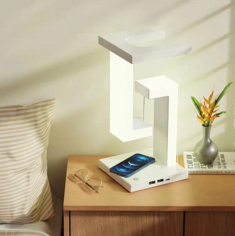 Stcraftdigital wireless charging suspension table lamp with floating balance design for home or bedroom decor.