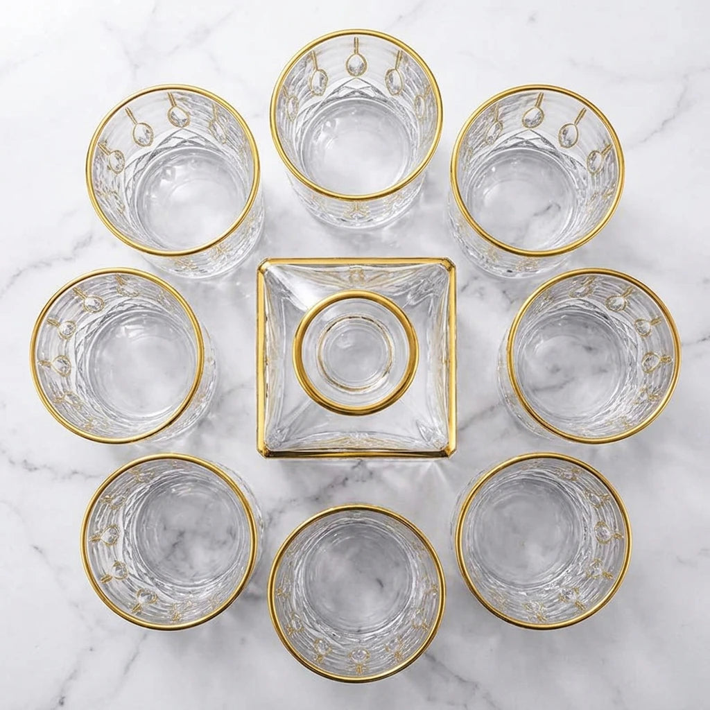 Seven-piece gold-trimmed liquor set for whiskey by stcraftdigital, including glasses and decanter for home bar use.