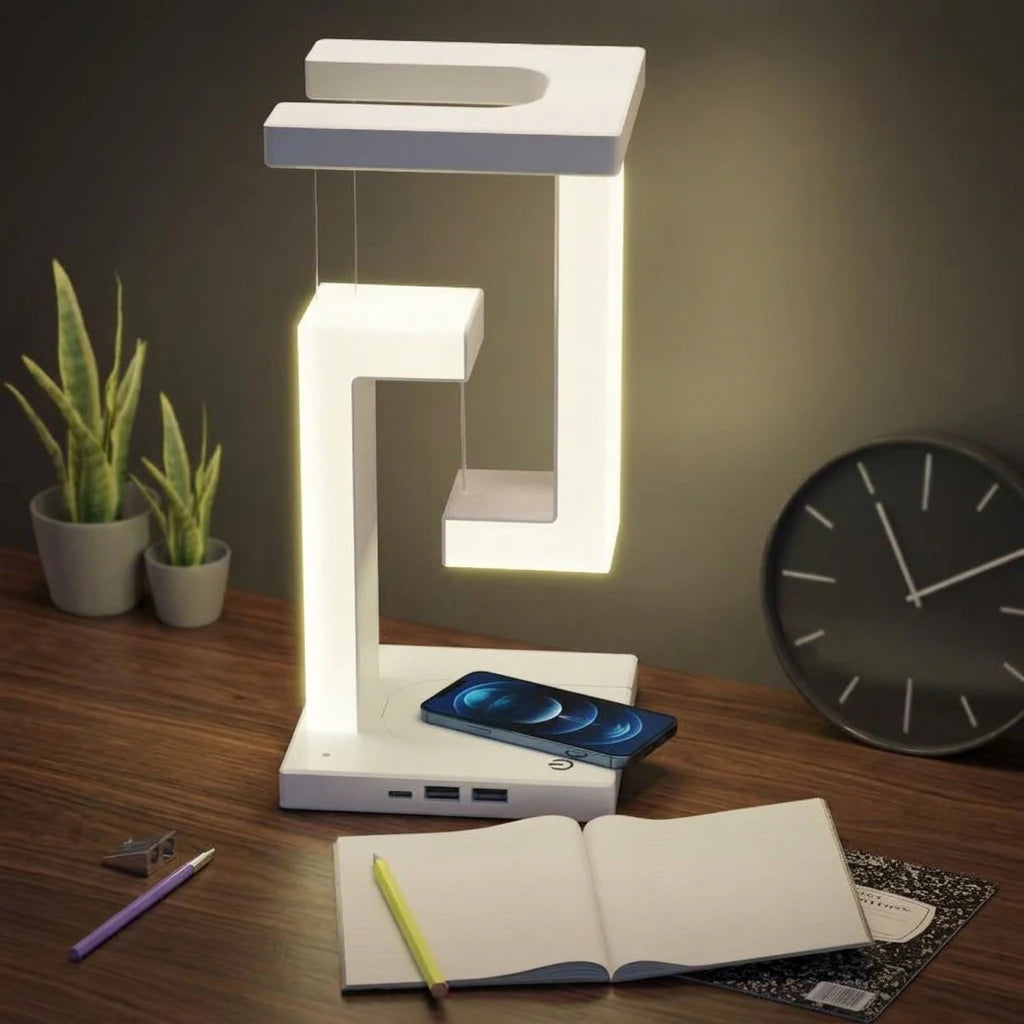 Creative wireless charging suspension table lamp by stcraftdigital with floating balance design for home and bedroom lighting.