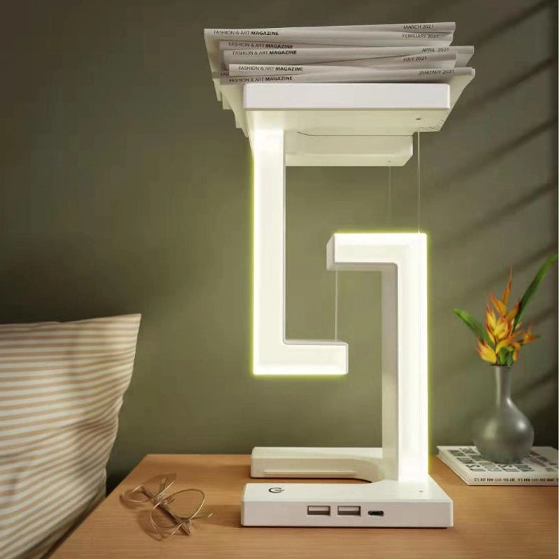 Creative wireless charging table lamp by stcraftdigital featuring a floating balance design for home and bedroom decor.