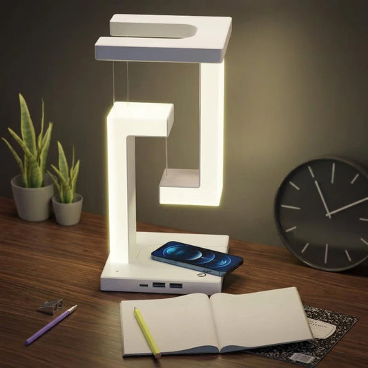 Creative wireless charging suspension table lamp by stcraftdigital with floating balance design for home and bedroom lighting.